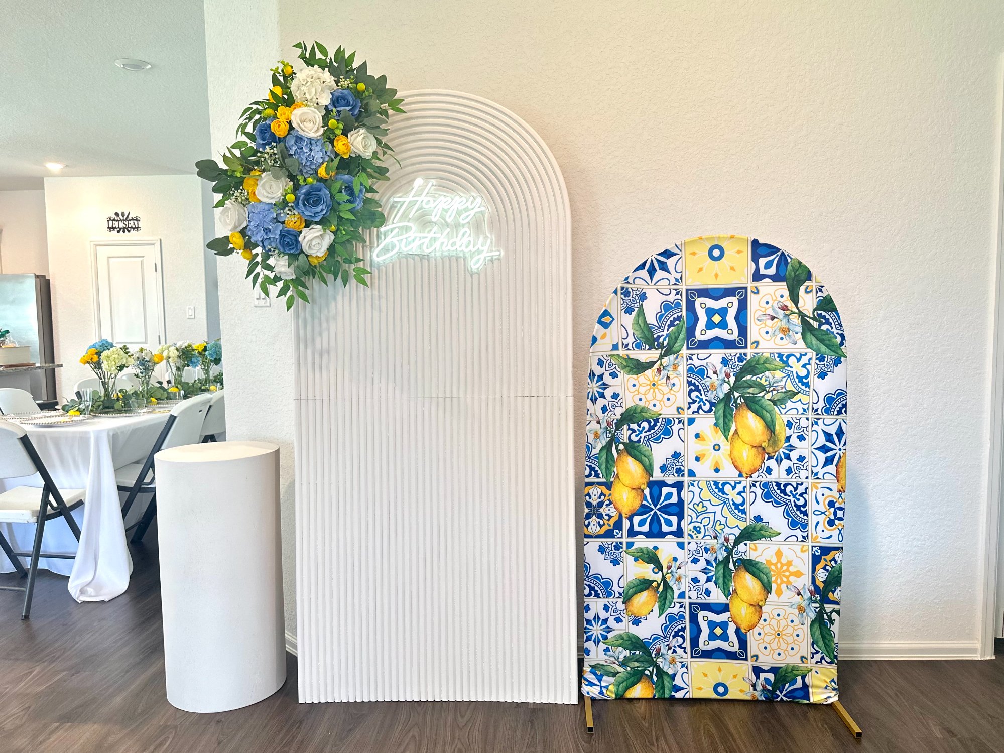 Lemon themed birthday backdrop with neon Happy Birthday sign